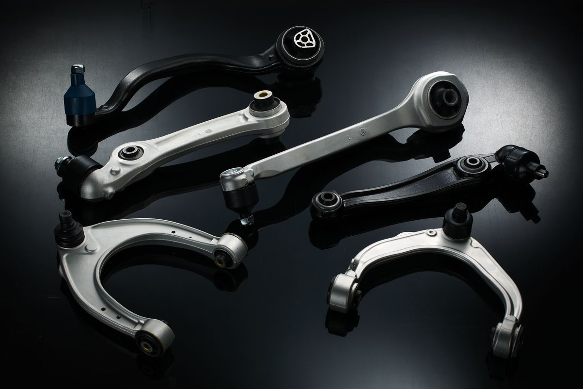 Forged automotive suspension control arms and components