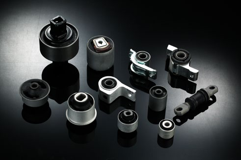 Automotive rubber bushings and rubber-to-metal components
