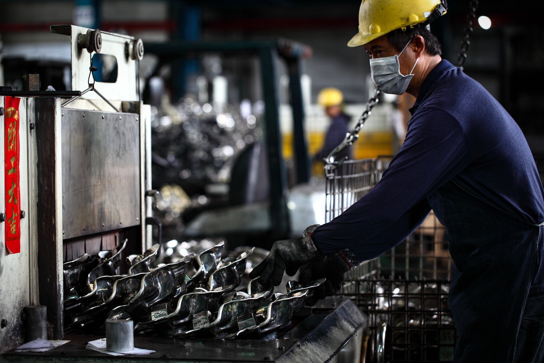 Worker handling forged components